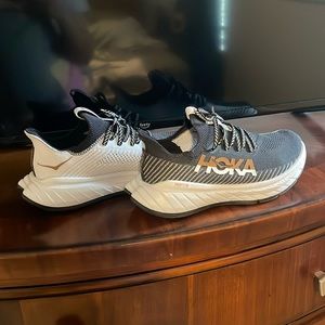 Hoka black and white sneakers